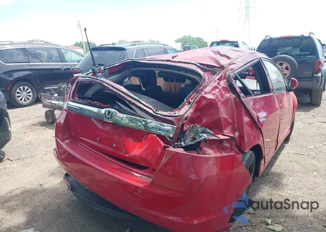 2012 Honda Insight Lx z USA, uszkodzony, nr VIN JHMZE2H55CS001589
